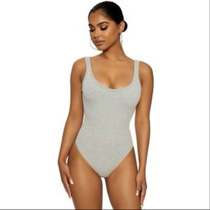 NAKED WARDROBE Snatched So Good Ribbed Bodysuit